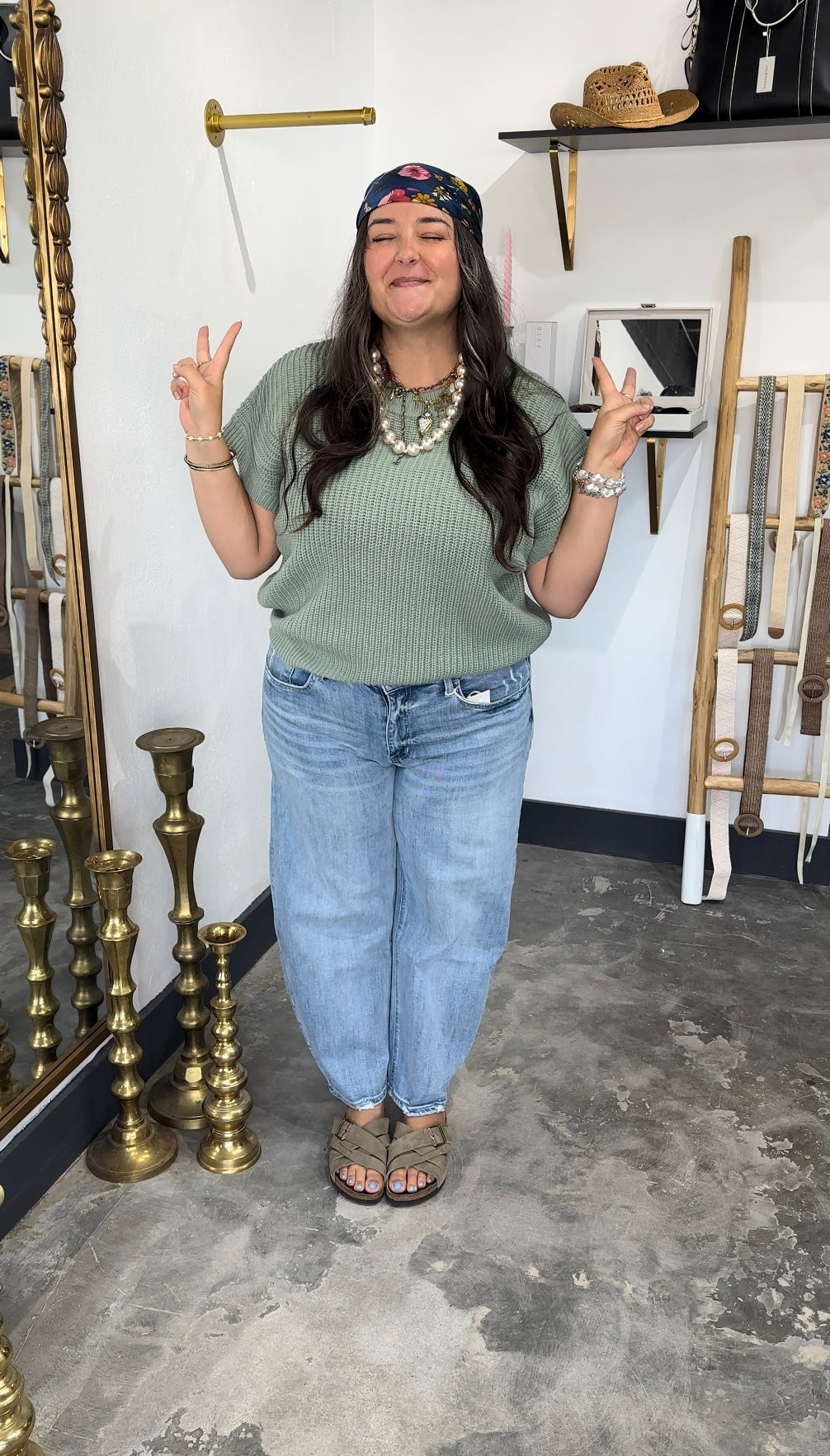 Woman wearing light wash barrel leg jeans