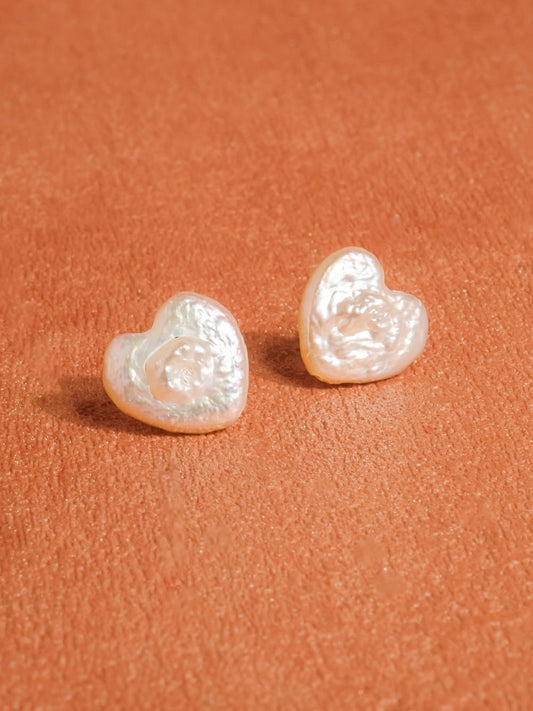 Mother of pearl heart shaped earring studs